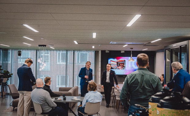 Team members presenting to a business audience